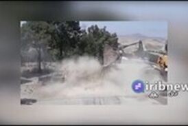 خاموش کردن پیکان آتش گرفته با لودر