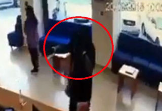 سرقت از بانک با پوشش زنانه و اسلحه اسباب‌بازی!