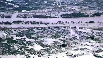 تصاویر هوایی از طغیان رودخانه در ژاپن و فرو رفتن خانه‌ها به زیر آب 